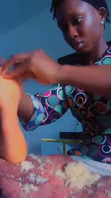 Tina at work, giving a client a pedicure